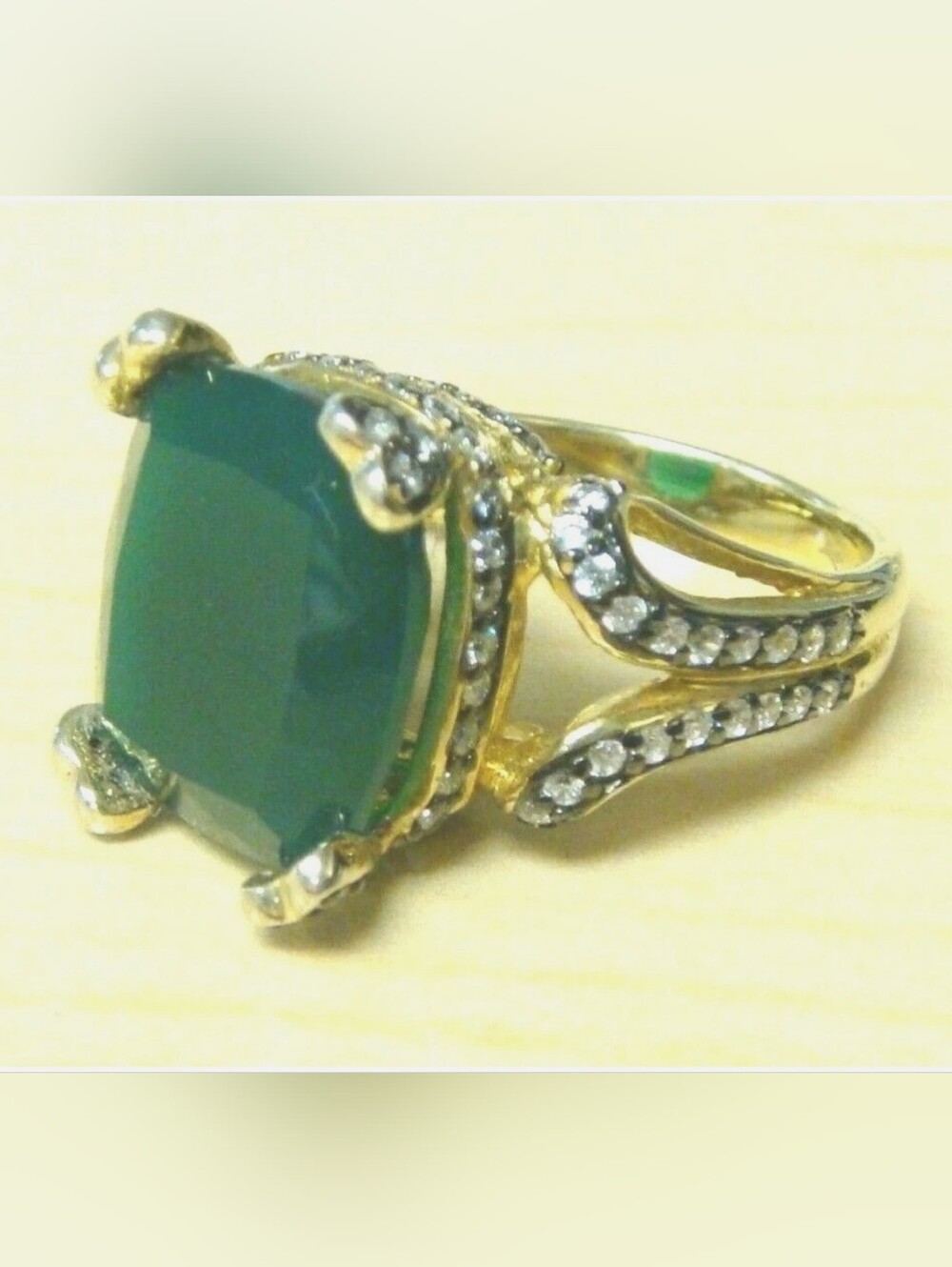 Gold-Tone Ring with Dark Green Cushion Stone and Crystal Accents